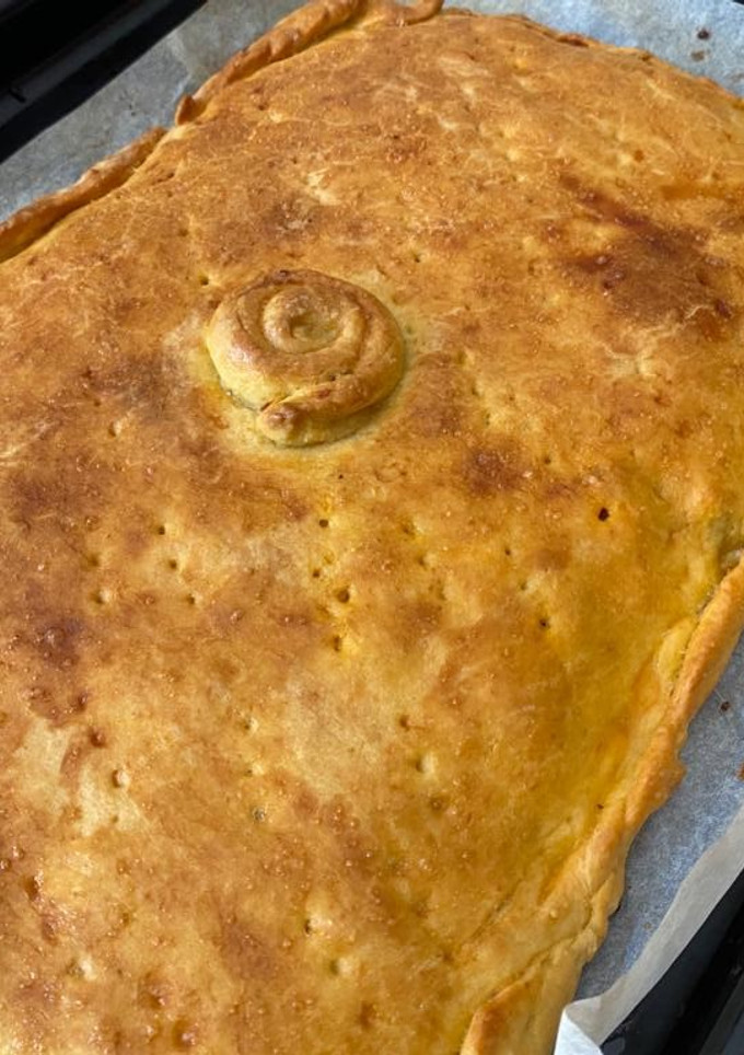 Una foto de Empanada de solomillo de cerdo, bacon y chorizo