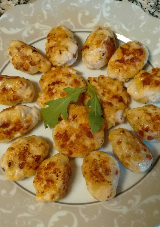 Una foto de Mini hamburguesas o bocaditos de jamón y pechuga de pollo