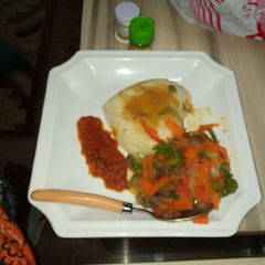 Couscous and shredded beef sauce with stew A picture of Couscous and shredded beef sauce with stew.