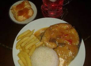 Una foto de Bagre gratinado en salsa de champiñones