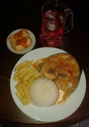 Una foto de Bagre gratinado en salsa de champiñones