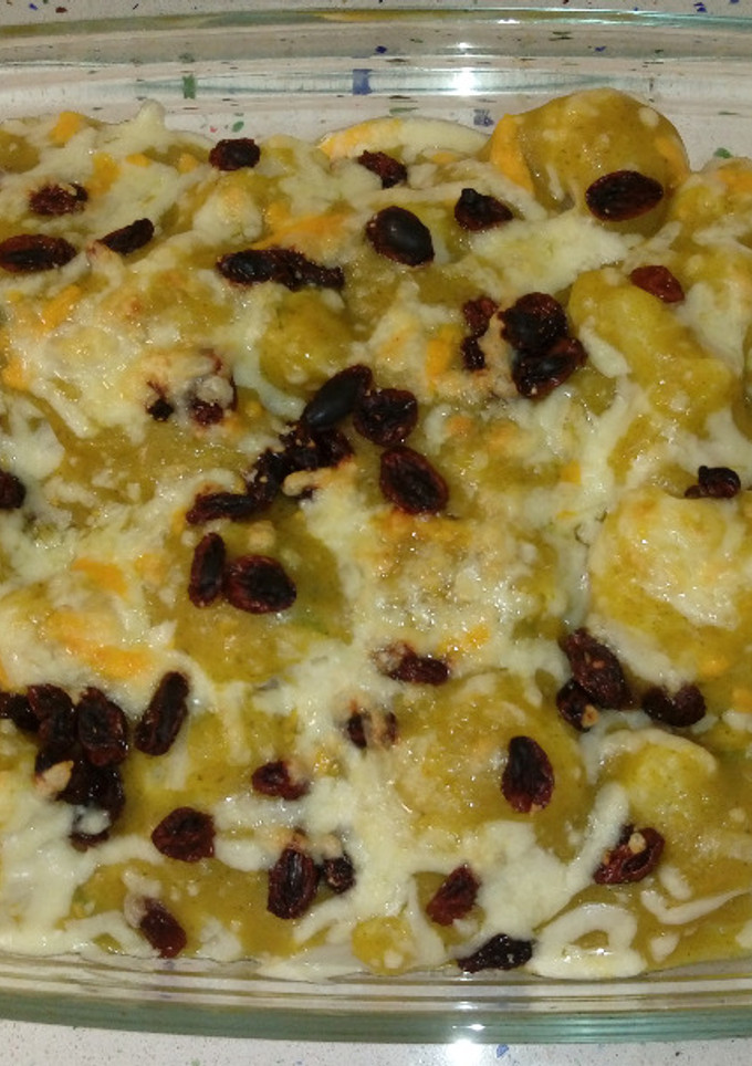 Una foto de Coliflores con crema de calabacín, pasas y queso