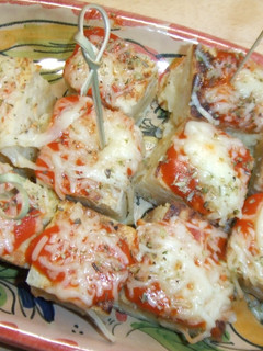 Una foto de Aperitivo de tortilla a la pizza
