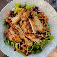 Kale Peanut Slaw w peanut vinaigrette plus peanut chicken A picture of Kale Peanut Slaw w peanut vinaigrette plus peanut chicken.