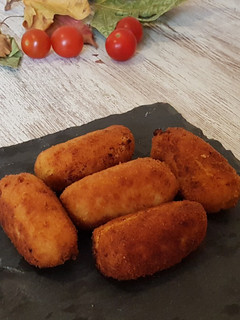 Una foto de Croquetas de calabaza asada y queso feta