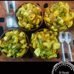 A picture of Macaroni with Beans and cheese.