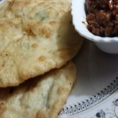 A picture of Stuffed paneer bhature.