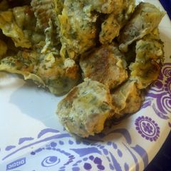 A picture of Parmesan chicken nuggets.