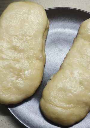 A picture of 馒头 STEAMED MILK BUNS. (I Made loaves).