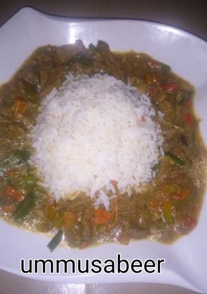 A picture of Shredded beef soup with rice.