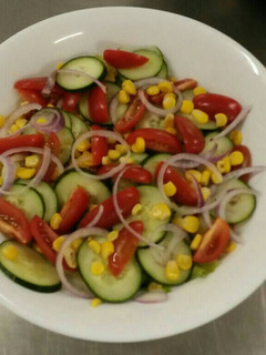 A picture of Sweetcorn and cucumber salad.