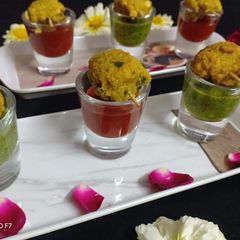 A picture of Methi chana daal pakodas shots.
