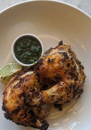 A picture of Spiced chicken with chutney.
