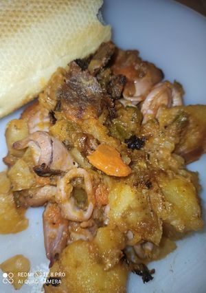 Una foto de Calamares Encebollados y Patata