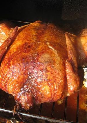 A picture of Whole smoked chicken.