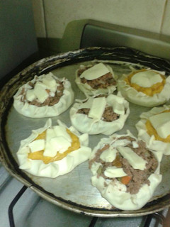 Una foto de Canastitas de carne y queso
