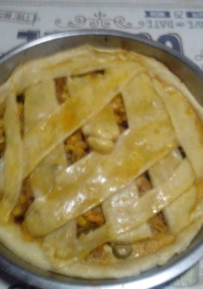 Una foto de Tarta de atún con pasas de uva y aceitunas