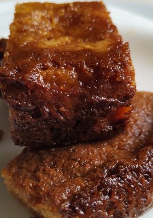 A picture of Chhena Poda with Jaggery.