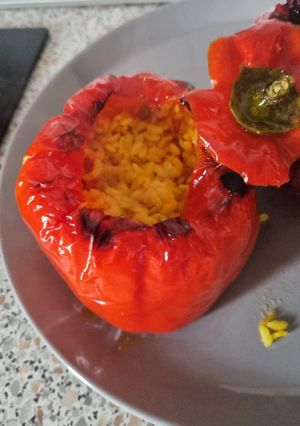 A picture of Bajoques Farcides Agres (Stuffed Peppers with Rice and Sausage).