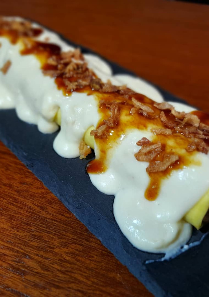 Una foto de Canelones de carrillera al Pedro Ximenez