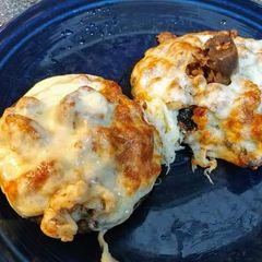 A picture of Air Fryer Sausage Stuffed Portobello Mushrooms with Provolone.