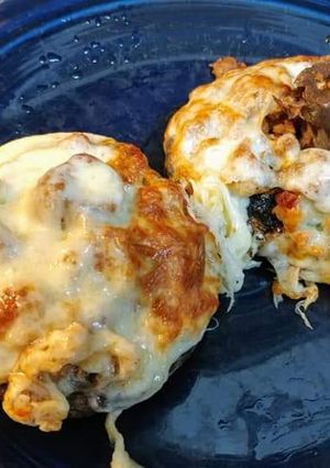 A picture of Air Fryer Sausage Stuffed Portobello Mushrooms with Provolone.