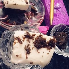 A picture of Eggless super delight brownie with vanilla icecream.