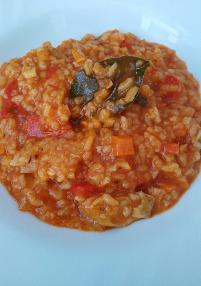 Una foto de Arroz caldoso con verduras y pescado