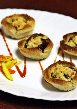 A picture of Bbq Paneer in toasted cups.