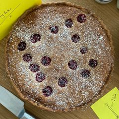 A picture of Raspberry frangipani tart.