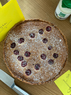A picture of Raspberry frangipani tart.