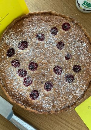 A picture of Raspberry frangipani tart.
