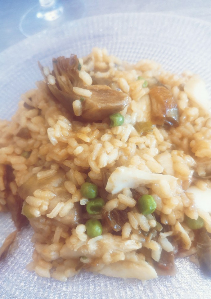 Una foto de Arroz de bacalao con alcachofa