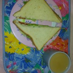 Tea with cinnamon and sandwich A picture of Tea with cinnamon and sandwich.