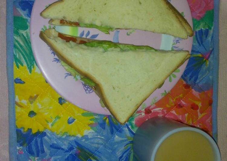 Tea with cinnamon and sandwich