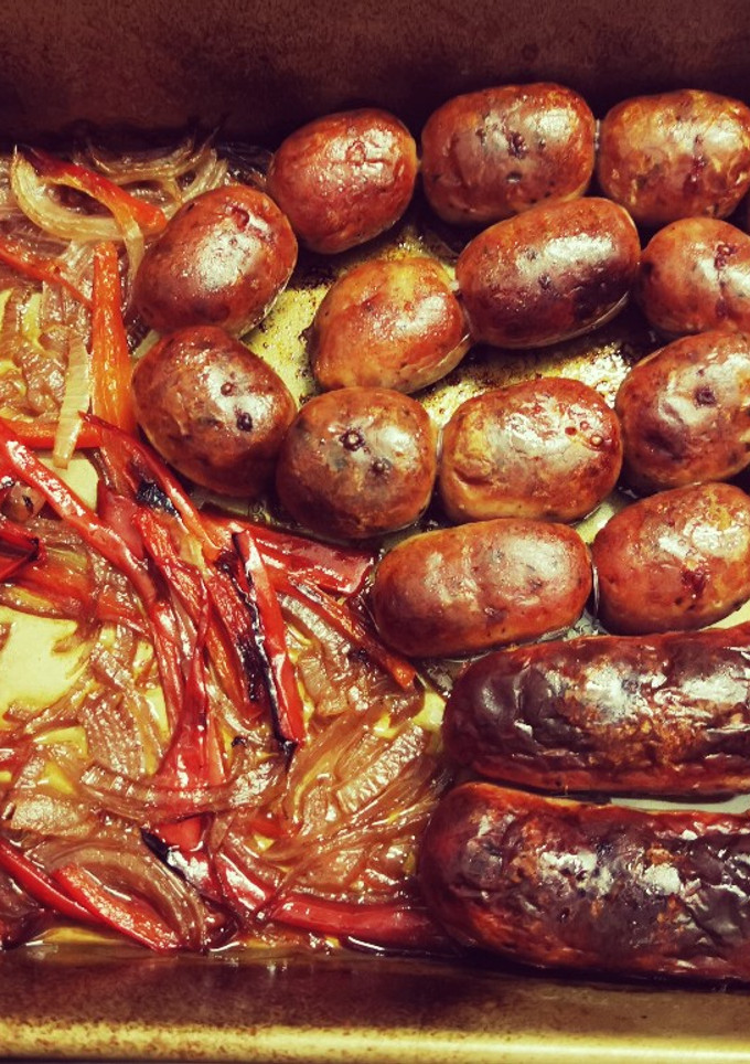 Una foto de Chorizos al horno en vino rosado