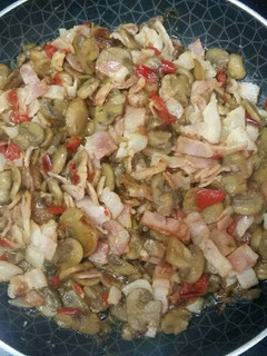 Una foto de Bacon con champiñón
