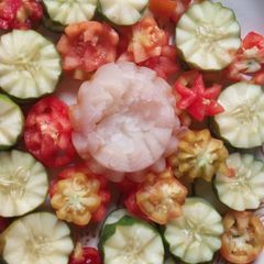 A picture of Cocumber, onions and tomatoes salad.
