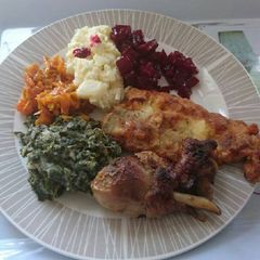 A picture of Fish fillet with veggies.