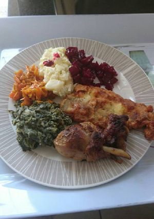 A picture of Fish fillet with veggies.