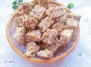 Foto de 葡萄干芝麻糖 (Doce de passas e sementes de gergelim) - China 🇨🇳
