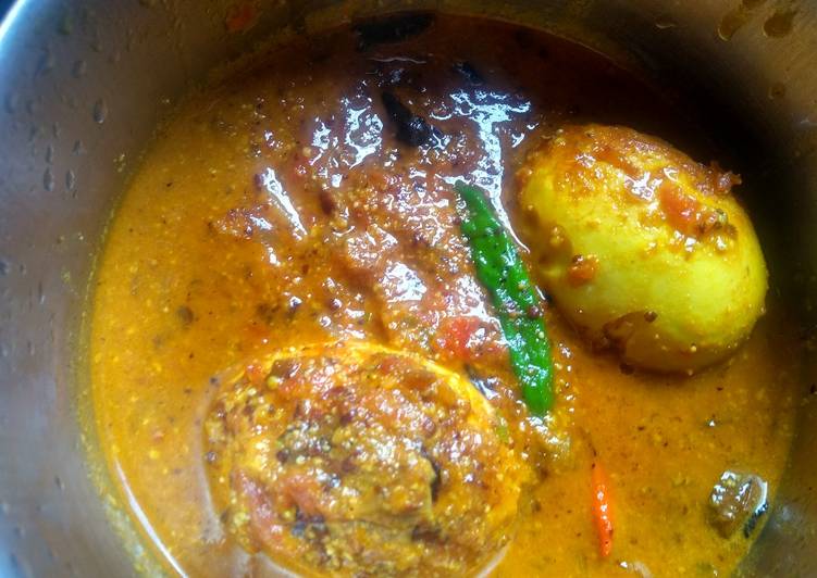 How to Prepare Quick Egg curry with mustard seeds and poppy seeds paste