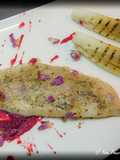 Filetto di scorfano con petali di rosa e hot lemon su crema di barbabietola con indivia grigliata