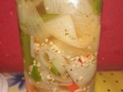 Una foto de conserva de escabeche