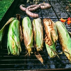 A picture of Corn with black garlic and mango chutney butter.