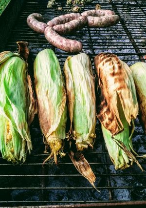 A picture of Corn with black garlic and mango chutney butter.