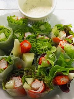 A picture of Crab Stick Salad Rolls with Wasabi Dressing - Bento Box Menu.