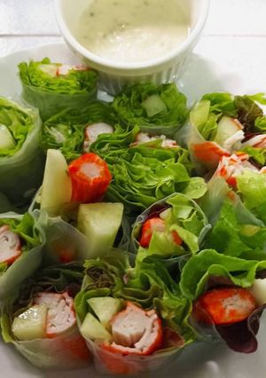 A picture of Crab Stick Salad Rolls with Wasabi Dressing - Bento Box Menu.