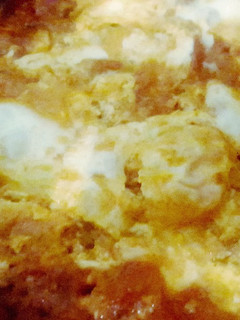 Una foto de Tomates con huevos