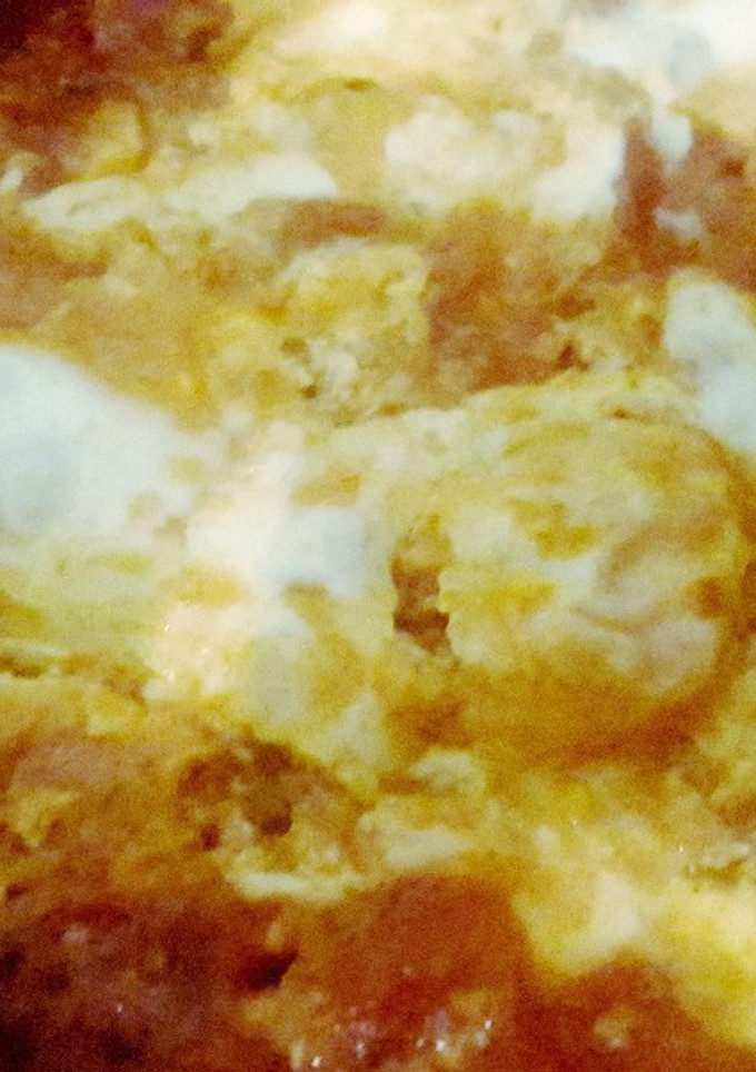 Una foto de Tomates con huevos